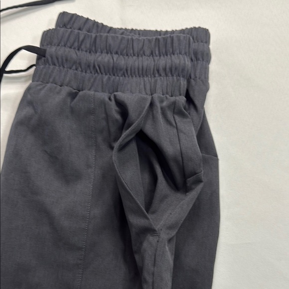 ZYIA Black Sweatpants with Tapered Legs and Elastic Cuffs - Picture 7 of 7